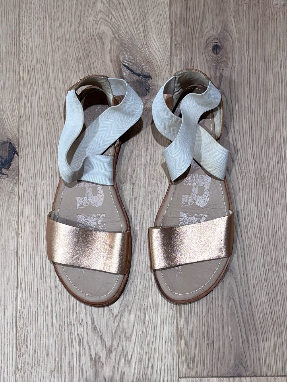 Sorel Metallic Rose Gold Sandals with Cream Wrap Straps